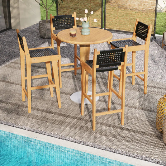 Set of 4 teak bar stools with black woven backs around a round teak table on Tampa Home & Garden Store