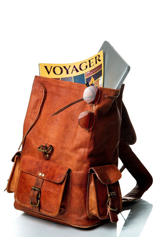 Alvarado tanned leather backpack with front pockets and sunglasses on Tampa Home & Garden Store