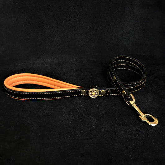 Bijou Orange Leather Dog Collar and black stitched leather collar on Tampa Home & Garden Store