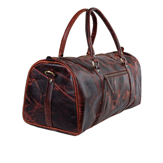 Brooks carry-on duffel bag in buffalo leather with dark brown patina and leather handles on Tampa Home & Garden Store