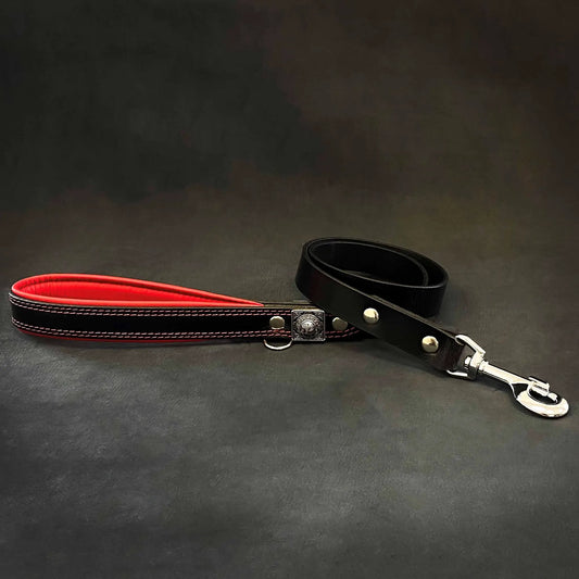 Eros Leather Leash 1 Inch Wide Black; two leather leads shown with red stitch on Tampa Home & Garden Store