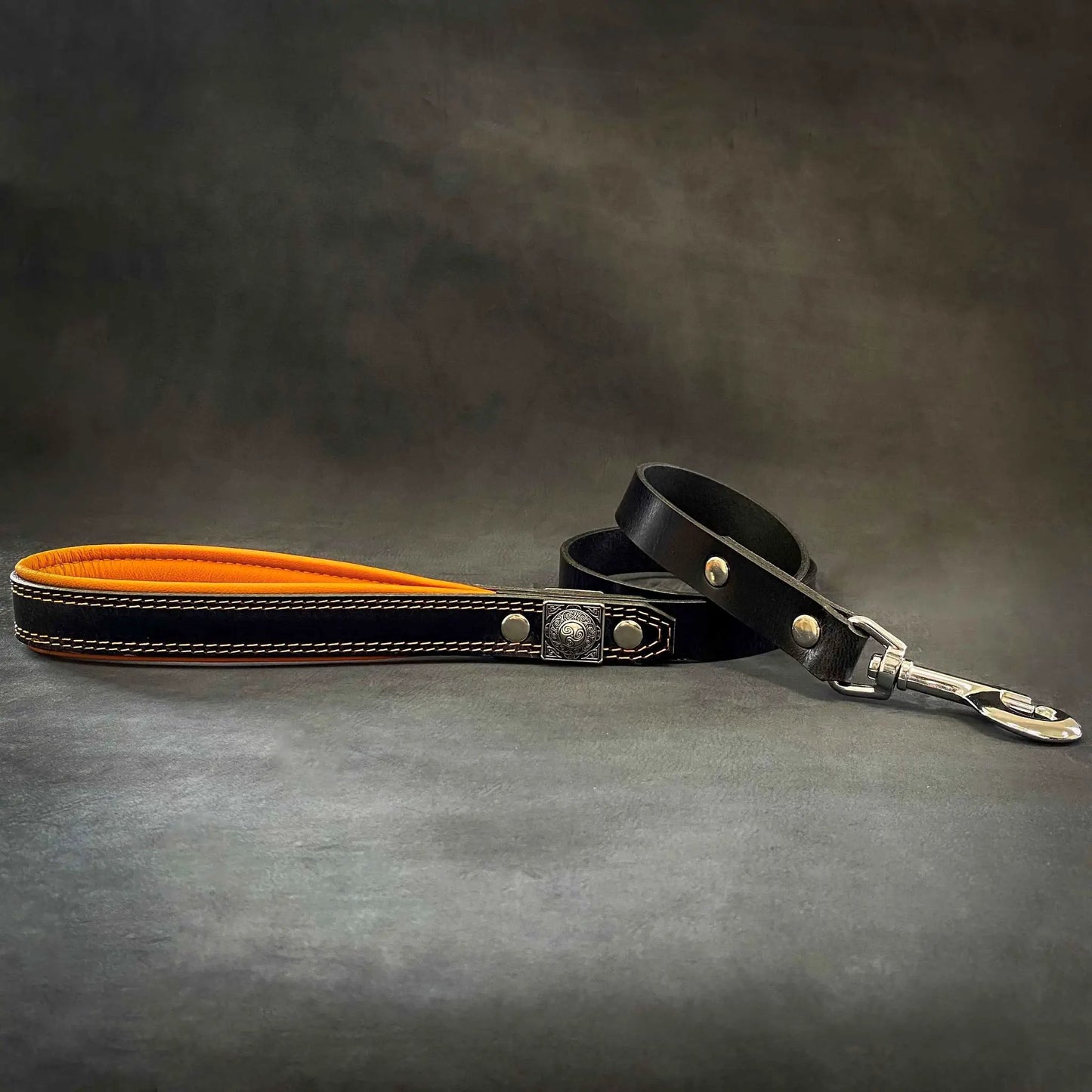 Eros Leather Leash 1 Inch Wide Black with orange underside and silver hardware on Tampa Home & Garden Store