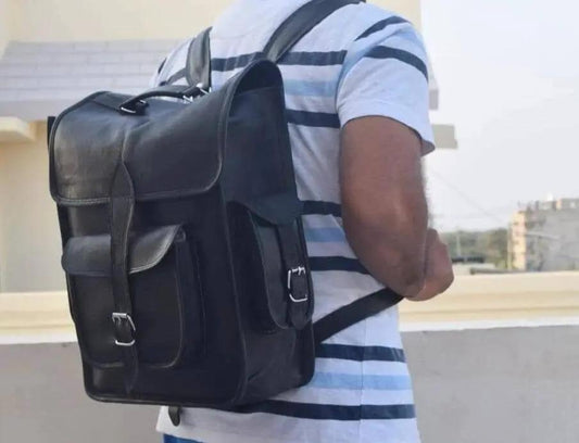 Ghostbuster Laptop Backpack, black leather-look with front pockets and buckle straps on Tampa Home & Garden Store