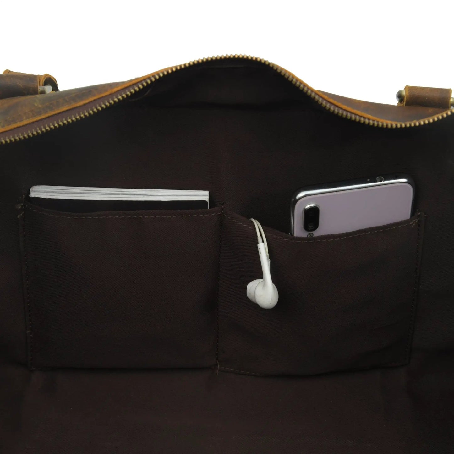 Goldman Hemingway Travel Duffel with brown leather trim and phone in pocket on Tampa Home & Garden Store