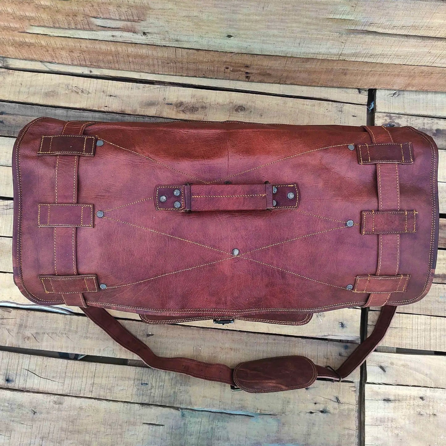 Genuine goat leather Harrison Duffel Bag in vintage brown with contrast stitching and rivets on Tampa Home & Garden Store