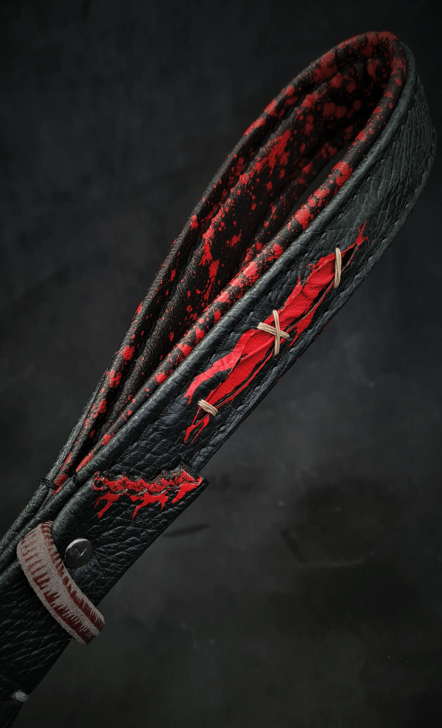 Haunted Leather Leash with Rivet Accents, black leather with red splatters and beige stitches on Tampa Home & Garden Store