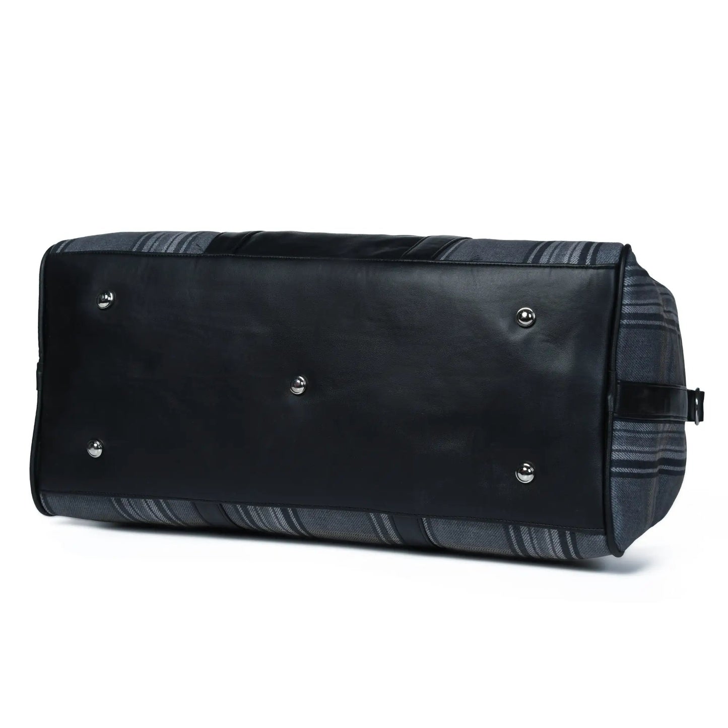 Highlander plaid canvas and leather duffle bag with black front panel and metal studs on Tampa Home & Garden Store