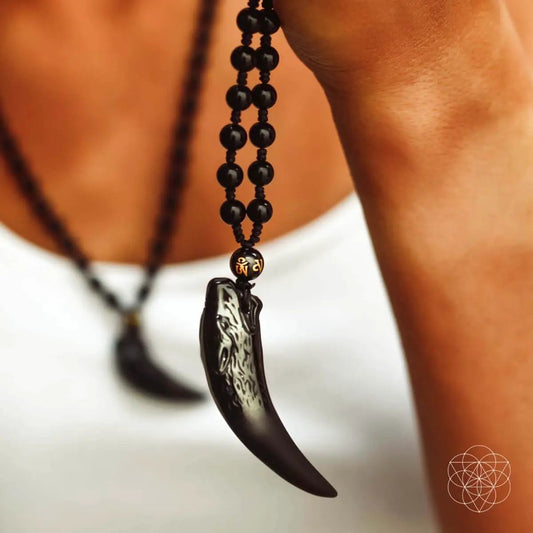 Obsidian Wolf Pendant Necklace with black bead chain and wolf carving by Conscious Items on Tampa Home & Garden Store