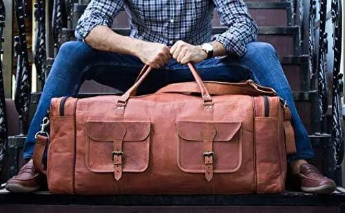 Oversized men's leather travel duffel bag in tan with front pockets by Classy Leather Bags on Tampa Home & Garden Store