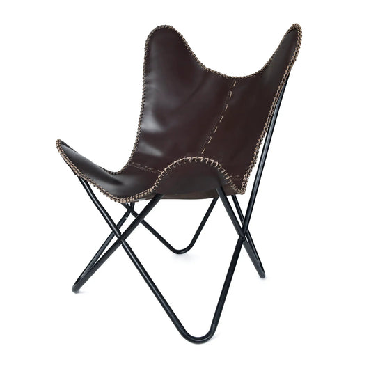 Vintage leather butterfly chair with dark brown upholstery and braided edge stitching on Tampa Home & Garden Store