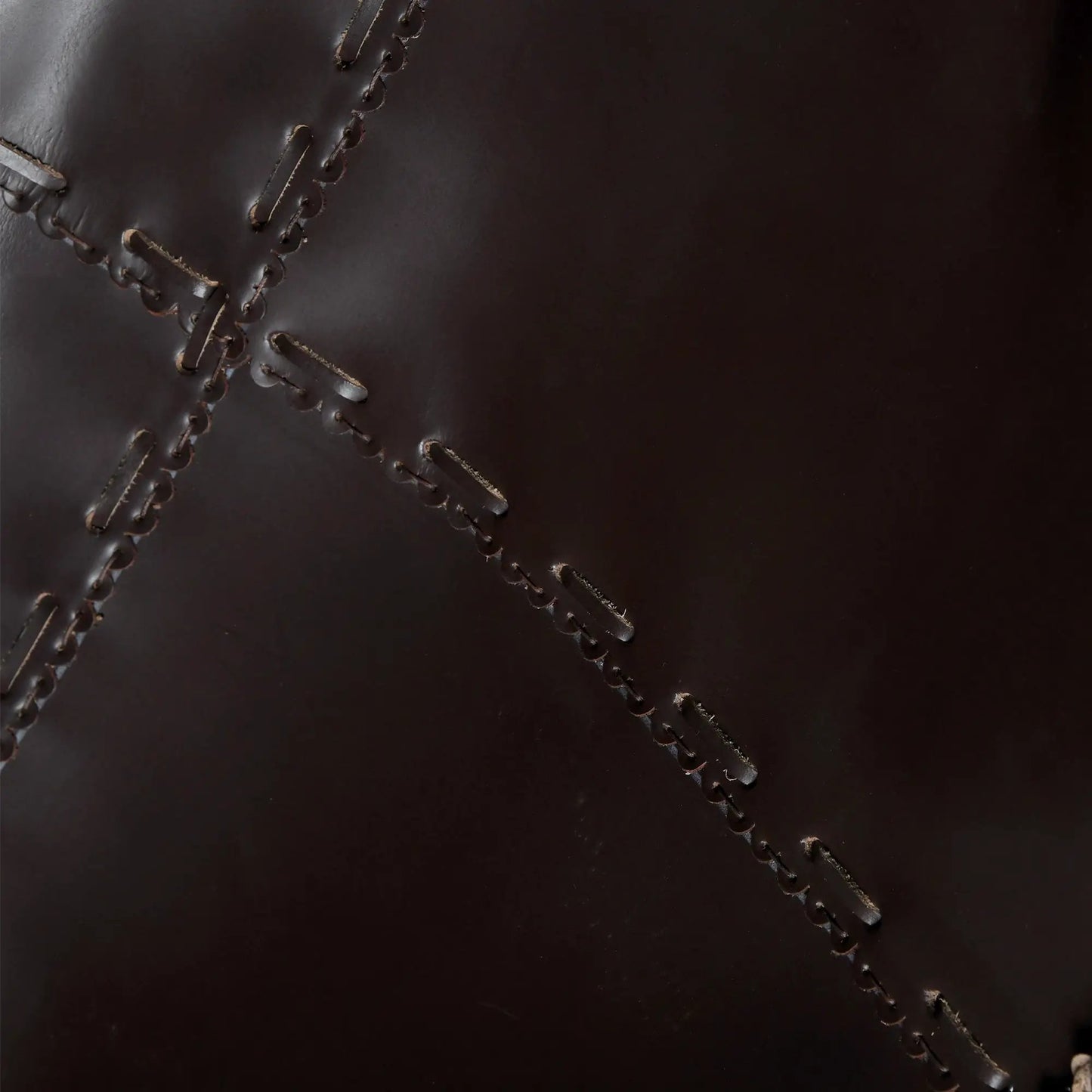 Vintage Leather Butterfly Chair in dark brown leather with exposed hand-stitched seams on Tampa Home & Garden Store