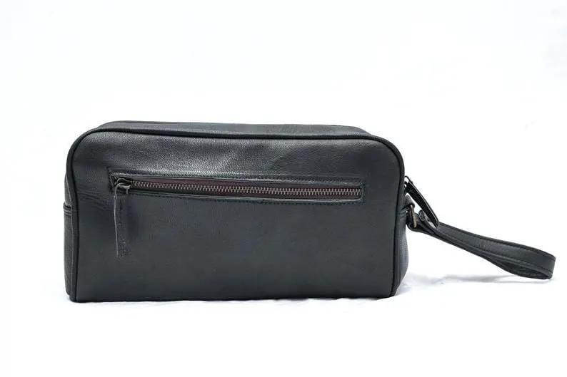 Twin-Section Black Leather Toiletry Bag with front zip pocket and wrist strap on Tampa Home & Garden Store