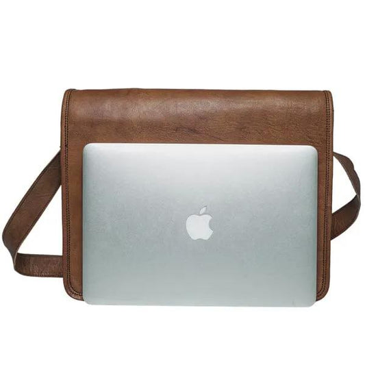 Urban Crossbody Laptop Bag for Everyday brown leather messenger bag with a silver laptop on Tampa Home & Garden Store