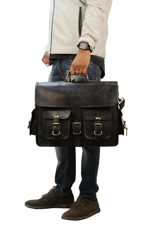 Vintage black leather briefcase messenger bag with front pockets and brass buckles, top handle on Tampa Home & Garden Store