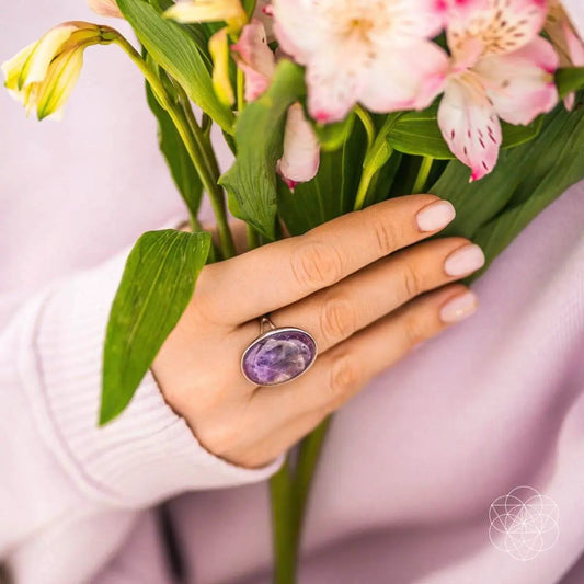 Visualization Amethyst Ring by Conscious Items, amethyst in bezel worn on hand with bouquet on Tampa Home & Garden Store