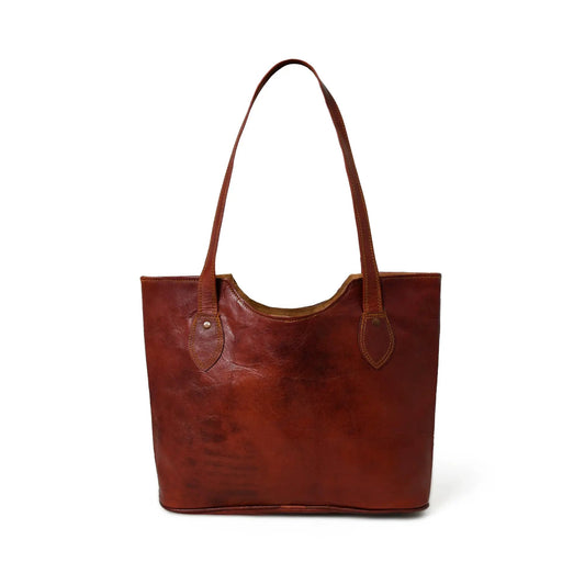 Timeless brown leather tote bag with dual top handles and stitched detailing on Tampa Home & Garden Store