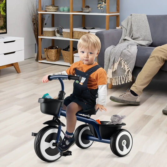 Toddler tricycle navy frame with adjustable seat and rear storage basket indoors on Tampa Home & Garden Store
