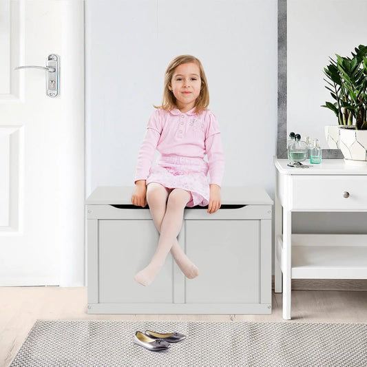 Safety hinge wooden toy chest organizer in light gray with a girl sitting on the lid on Tampa Home & Garden Store