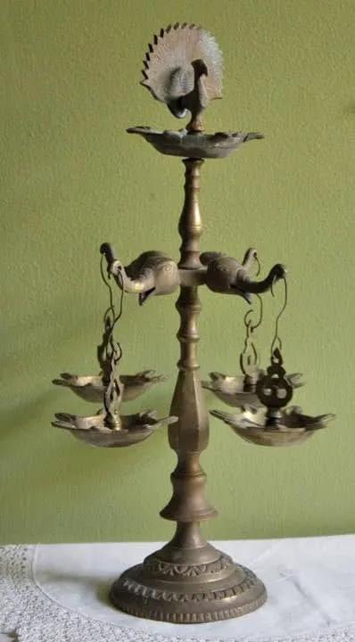 Antique brass five-burner diya lamp with ornate pedestal and bird accents on Tampa Home & Garden Store