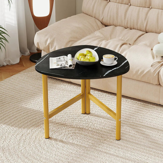Triangle oval coffee table with black marble top and yellow metal legs in living room on Tampa Home & Garden Store