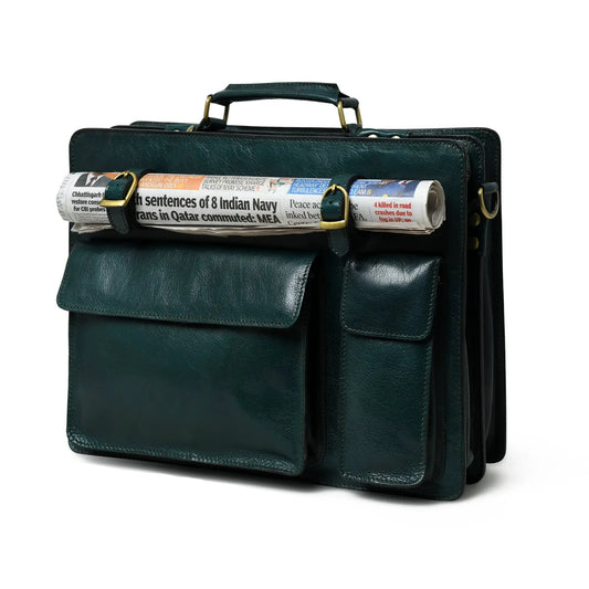 Tuscany Italian Leather Briefcase in green with brass hardware and newspaper strapped on Tampa Home & Garden Store