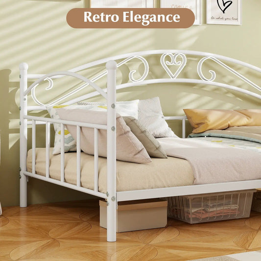 Twin size white metal daybed frame with decorative heart-scroll headboard and side rails on Tampa Home & Garden Store