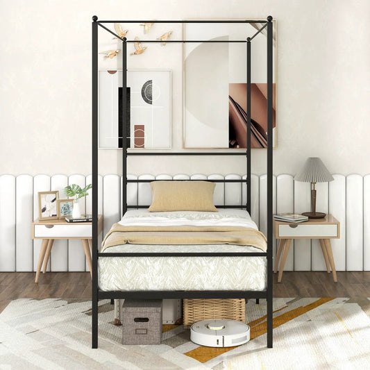 Black metal canopy bed frame with slat support and tall posts for a modern bedroom on Tampa Home & Garden Store