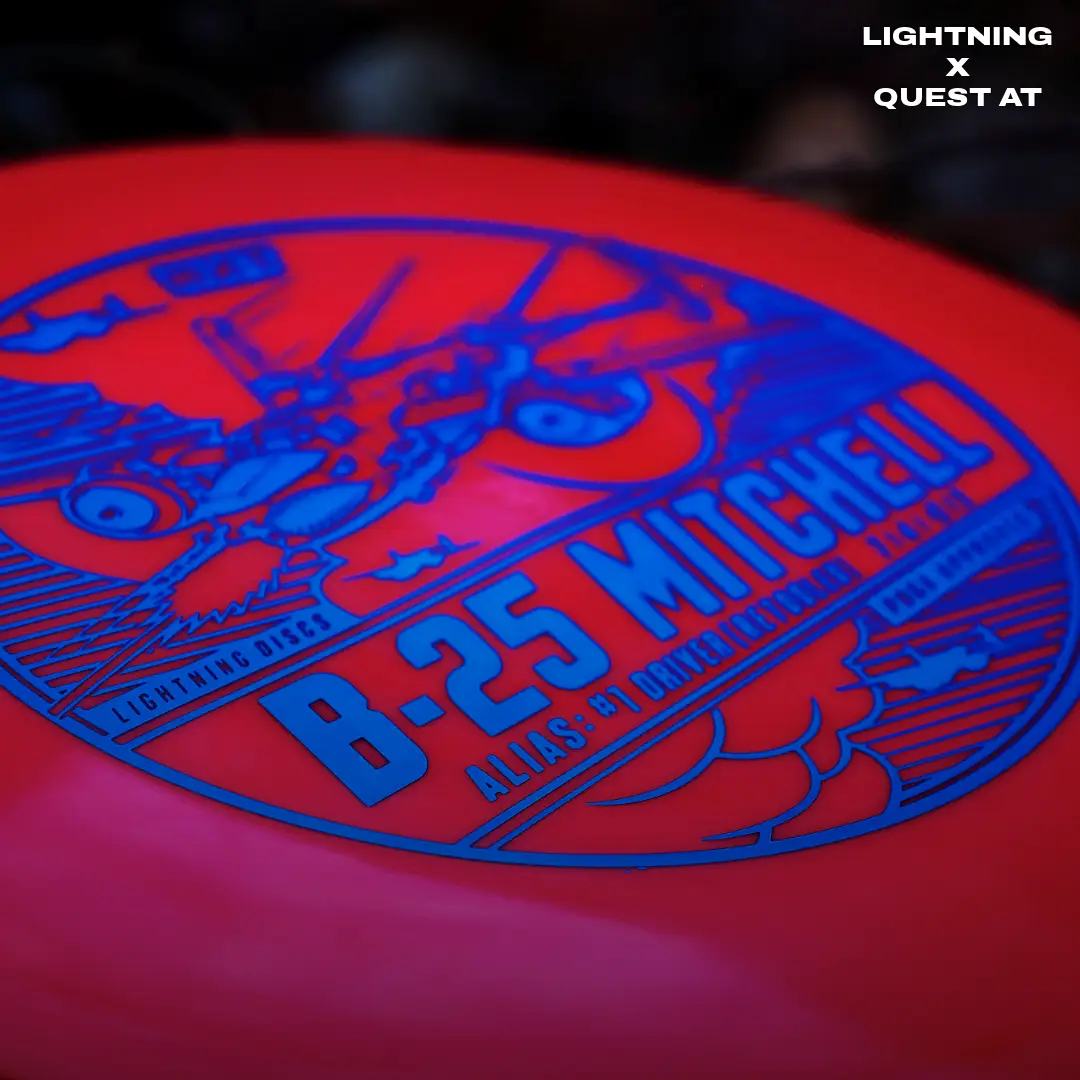 Lightning NXT B-25 Mitchell Driver fairway disc with bold blue B-25 graphic on red disc on Tampa Home & Garden Store