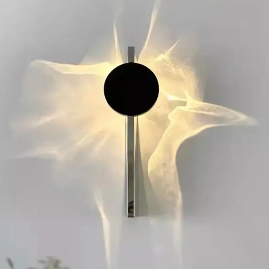 Stainless Rotatable LED Wall Sconce with black disc and chrome stem by Moktan Sabai on Tampa Home & Garden Store