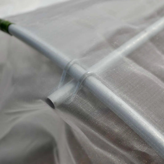 Heavy-duty insect netting Bootstrap Farmer, metallic woven mesh close-up on Tampa Home & Garden Store