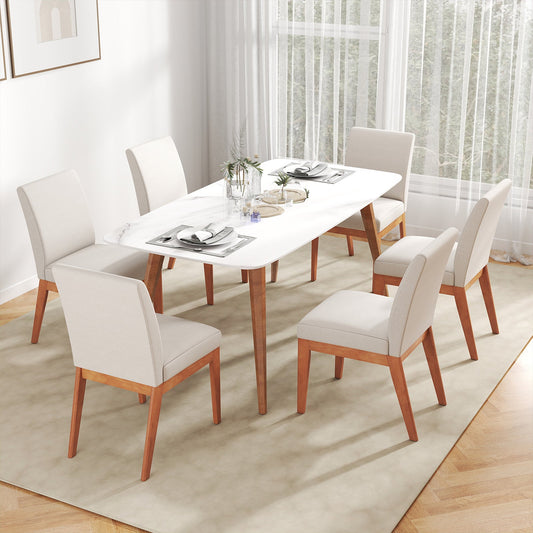Beige upholstered dining chairs set of 2 with wooden legs around a white table in a dining room on Tampa Home & Garden Store