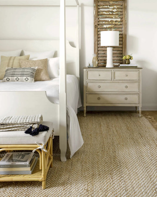 Becki Owens and Livabliss beige handmade woven area rug Boutique Rugs in a bedroom on Tampa Home & Garden Store