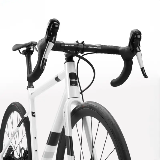 Vook One road bike with white frame and black drop handlebars, 13-speed drivetrain on Tampa Home & Garden Store