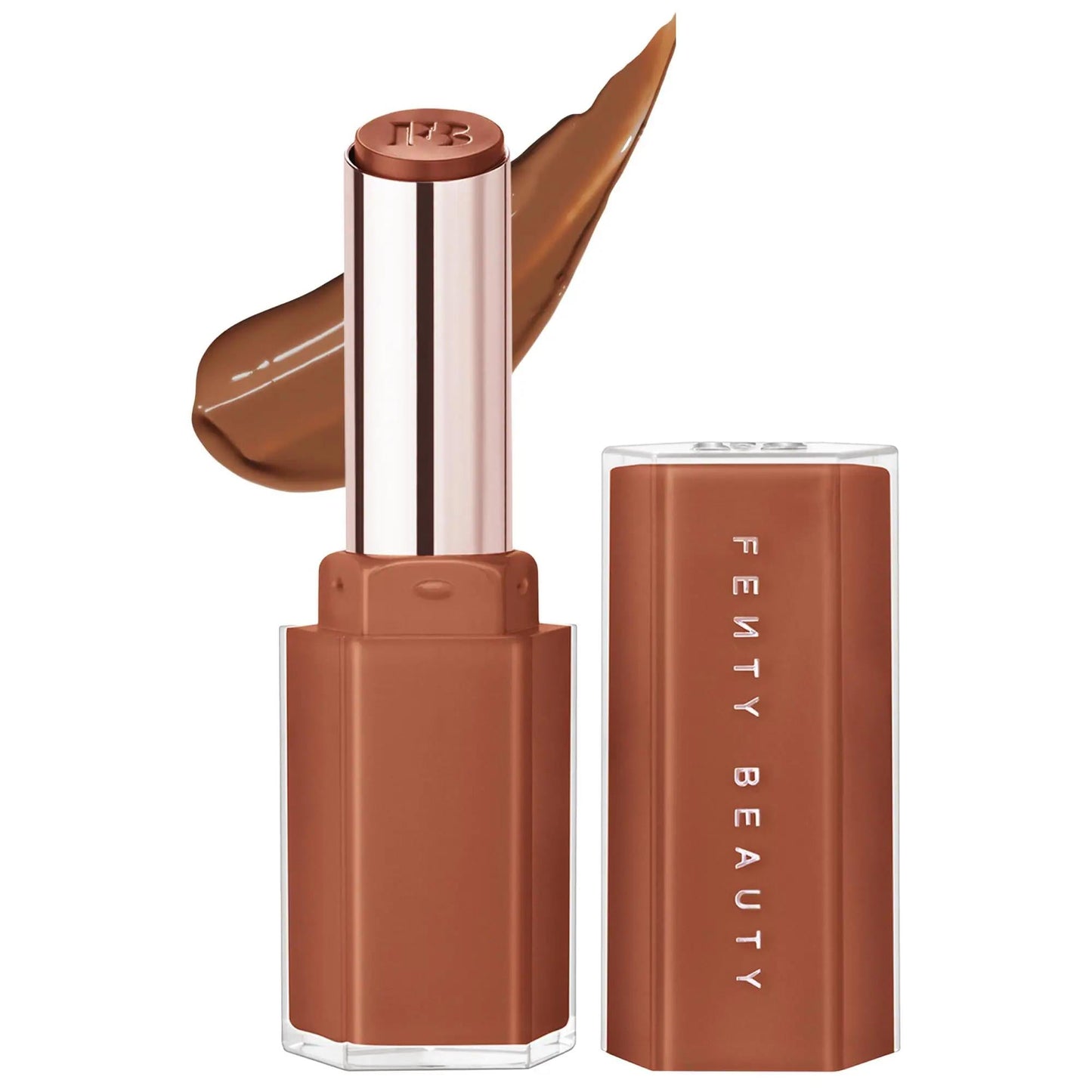 Fenty Beauty Gloss Bomb Stix lip gloss in brown shade with rose-gold tube beside brown box on Tampa Home & Garden Store