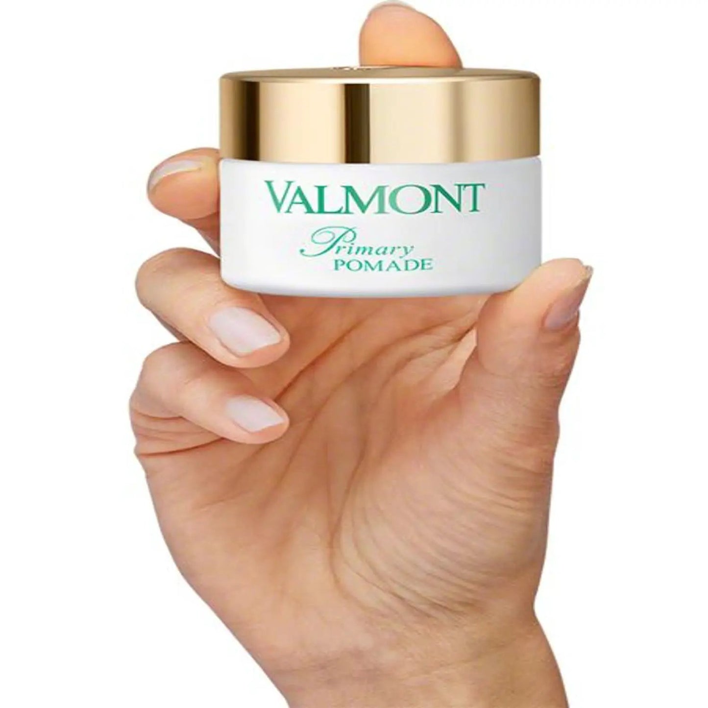 Valmont Primary Pomade 50ml jar with white container and gold cap held in hand on Tampa Home & Garden Store