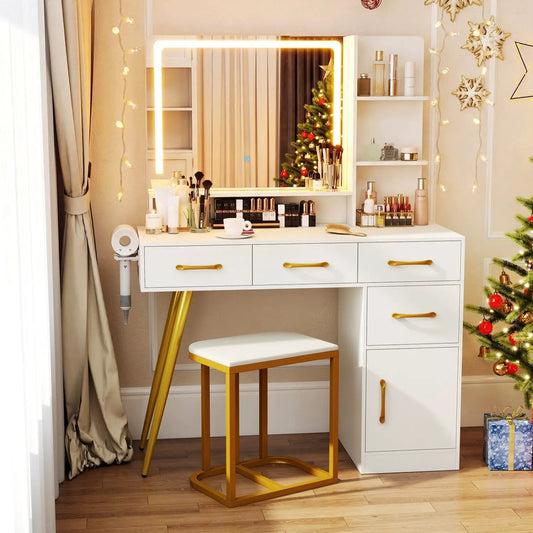 Lighted vanity with LED mirror, white table, and gold handles with a gold stool on Tampa Home & Garden Store