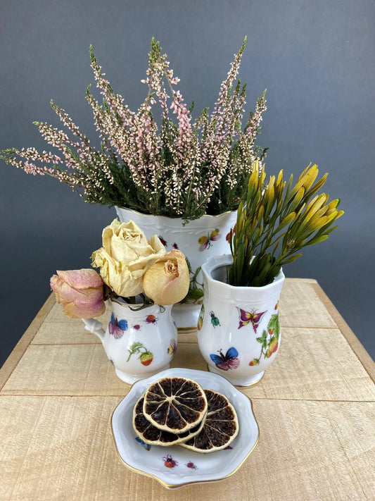 Porcelain butterfly and strawberry motif vases with heather and florals, 2-piece set on Tampa Home & Garden Store