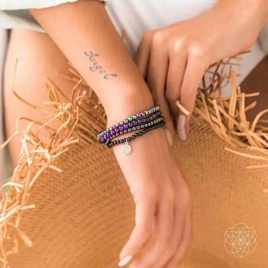 Veil of Protection bracelet set; rainbow beaded stack with purple and black beads on Tampa Home & Garden Store