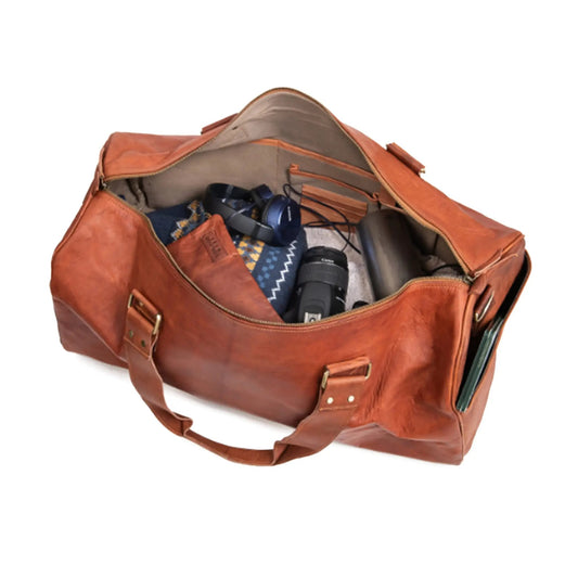 Vincent Morton Cabin Duffle Bag brown leather, open with camera gear inside on Tampa Home & Garden Store