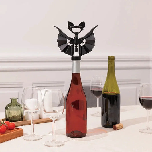 Vino 2-in-1 corkscrew and bottle opener, black bat-wing design on red wine bottle on Tampa Home & Garden Store