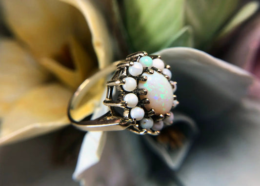 Vintage 10k gold opal cluster ring with 13 white opals in an antique setting on Tampa Home & Garden Store