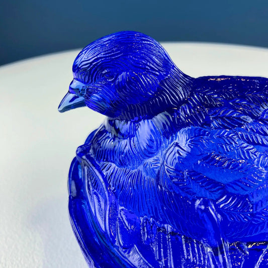 Vintage Nesting Dove Cobalt Blue Glass Bowl close-up with textured feather details on Tampa Home & Garden Store
