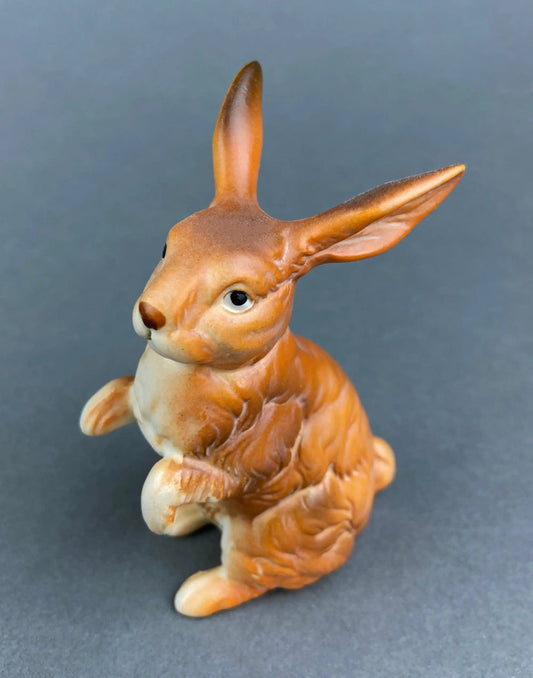 Vintage hand-painted porcelain rabbit figurine with tall ears in orange-brown glaze on Tampa Home & Garden Store
