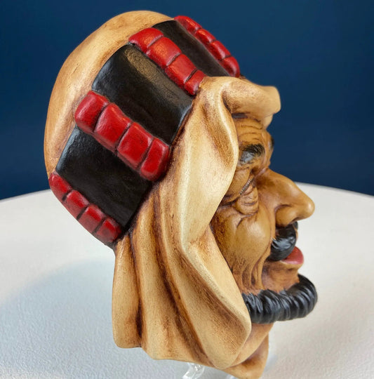 Chalkware Bust of Kurdish Man with Turban, red beaded headpiece and black detailing on Tampa Home & Garden Store
