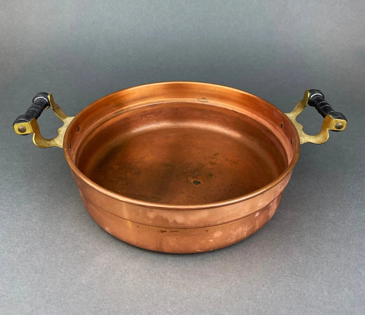 Vintage copper serving dish with wooden handles and rustic patina on Tampa Home & Garden Store