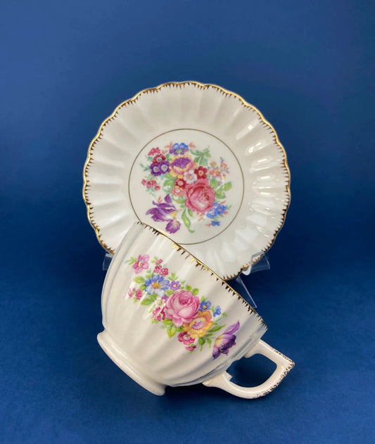 Vintage Leigh Wake floral dish set with scalloped gold trim plates and teacups on Tampa Home & Garden Store