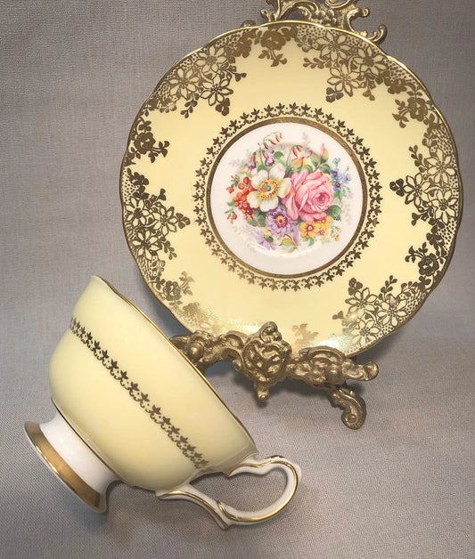 Vintage Grosvenor teacup and saucer England yellow with gold trim on Tampa Home & Garden Store