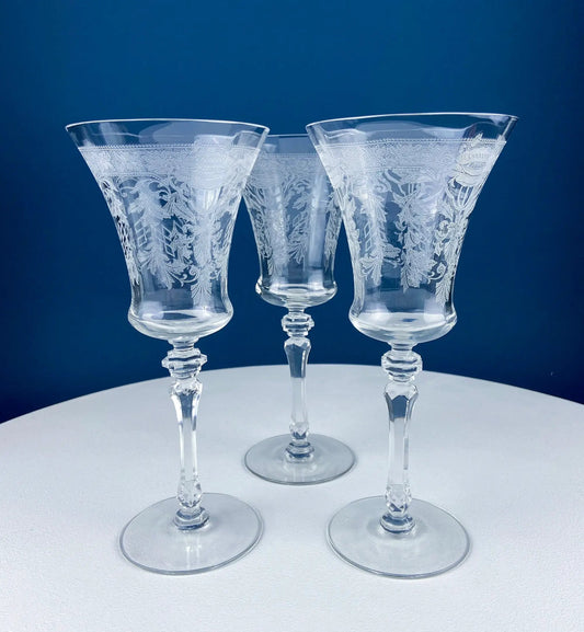 Vintage etched poppies crystal goblets, set of seven, three shown, clear floral-engraved stemware on Tampa Home & Garden Store
