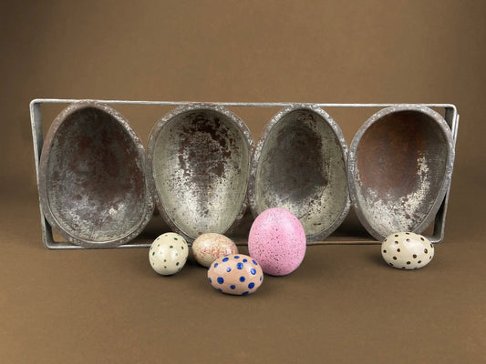 Vintage extra large chocolate egg molds in a four-slot metal tray with rustic finish on Tampa Home & Garden Store