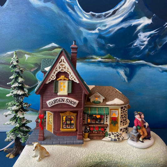 Lemax Vintage Garden Shop Christmas Village House brown cottage with green shutters and snow on Tampa Home & Garden Store
